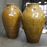 A large pair of Chinese urns of ovoid ou