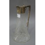 A silver mounted claret jug, the wrythen