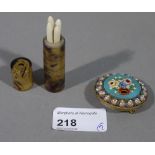 A miniature manicure set of four items c