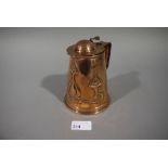 An Art Nouveau copper lidded jug, repous