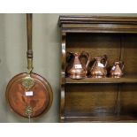 A set of three copper measures, pint, ha