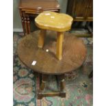 An oak oval drop leaf occasional table a