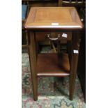 A bedside table with drawer and undertie