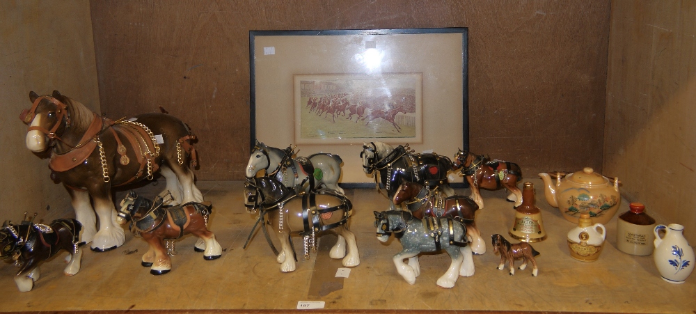 A collection of pottery heavy horses, ma