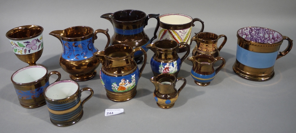 A collection of copper lustre ware inclu