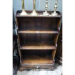 A set of oak waterfall bookshelves with