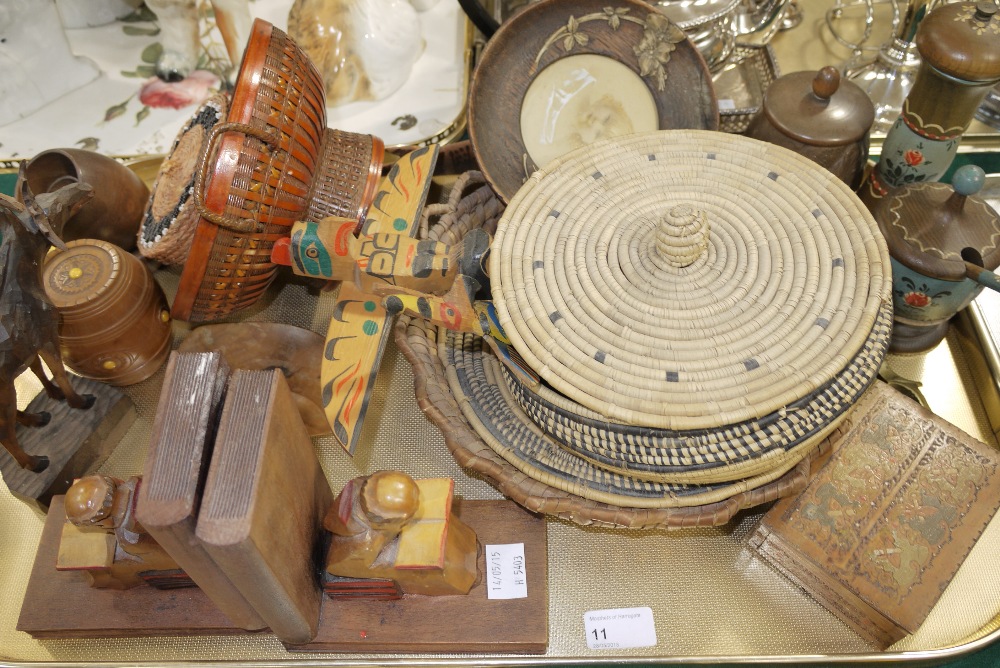 A collection of treen and basket ware in