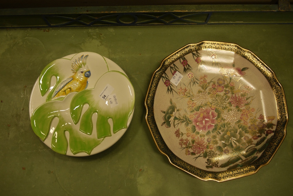 An Italian pottery plate moulded with a