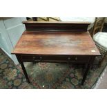 An Edwardian mahogany wash stand having