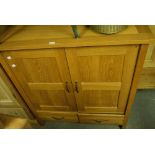 A Laura Ashley pale oak TV cabinet