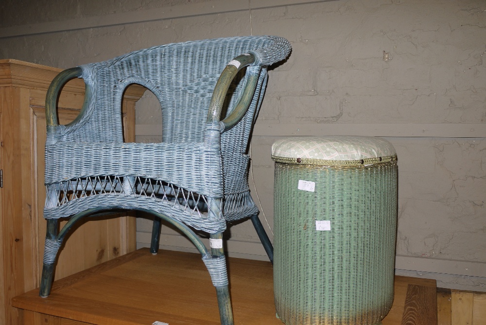 A wicker armchair together with a Lloyd