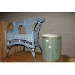 A wicker armchair together with a Lloyd