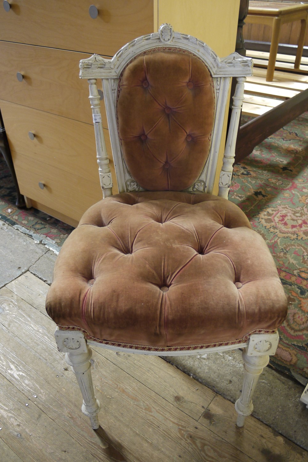 A Victorian cream finished chair, having