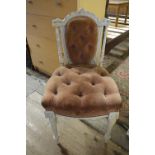 A Victorian cream finished chair, having