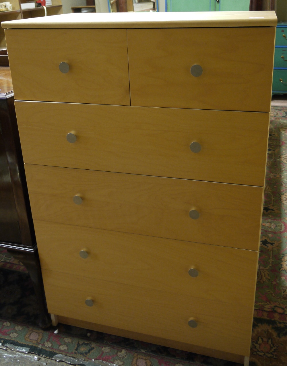 An MDF six-drawer chest with polished st