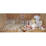 A shelf of assorted table glass, includi