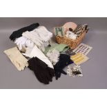 A basket of buttons, lace, fur collar,