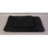 Two lengths of heavy black wool cloth