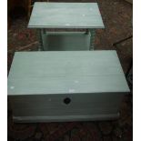 A green and cream painted blanket box;