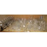 A part suite of clear black stemmed drinking glasses, quantity of cut glass,