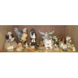 A small quantity of composition and ceramic owls and other animals