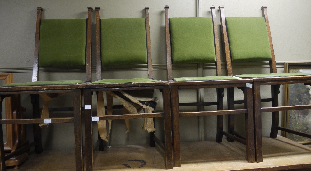 Five early 20th century oak side chairs in Arts and Crafts style with green velvet upholstered