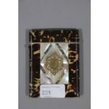 A 19th century tortoiseshell mother of pearl abalone and gilt metal inset travelling card case