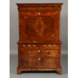 AN EARLY 18TH CENTURY FIGURED WALNUT ESCRITOIRE,