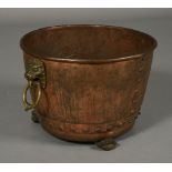 A 19TH CENTURY RIVETED COPPER LOG BIN, on paw feet,