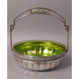 A WMF ELECTROPLATED BASKET with stiff overhead handle cast with foliate border and panelled base,