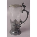 A WMF SILVER PLATED AND ETCHED GLASS LIDDED TANKARD, cast with fruiting vine, trellis and cartouche,