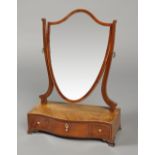 A GEORGE III MAHOGANY AND BOXWOOD LINE INLAY TOILET MIRROR, with shield shaped plate,