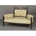 A LATE 19TH CENTURY AESTHETIC MOVEMENT EBONISED AND GILT SOFA,