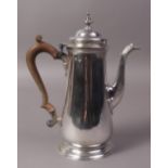A GEORGE III SILVER COFFEE POT by Gurney and Cooke London 1752, with blade finial,