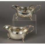 A PAIR OF GEORGIAN STYLE SILVER SAUCEBOATS BY GARRARD & CO, London,