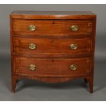 A REGENCY PERIOD MAHOGANY BOW FRONT CHEST OF THREE DRAWERS, with crossbanding and satinwood banding,