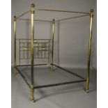 A VICTORIAN LACQUERED BRASS BED with globular finials, tubular uprights and railed foot on castors,