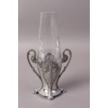 A WMF SILVER PLATED AND CLEAR GLASS TWO HANDLED VASE, cast with pierced shell and flower garland,