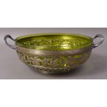 A WMF ELECTROPLATED DOUBLE HANDLED FRUIT BOWL with pierced vine border and double loop handles,