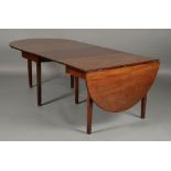 A 19TH CENTURY MAHOGANY DINING TABLE, with two sections, one with rounded full flap,