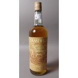 Tamdhu 8 years old, 70° proof 26 ⅔ fl oz, purchased 1974, level base neck.