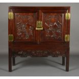 A CHINESE ROSEWOOD CABINET ON STAND, 19th century,