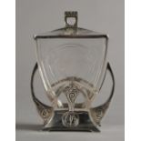 A SECESSIONIST SILVER PLATED AND ETCHED CLEAR GLASS TWO HANDLED BISCUIT BARREL AND COVER of
