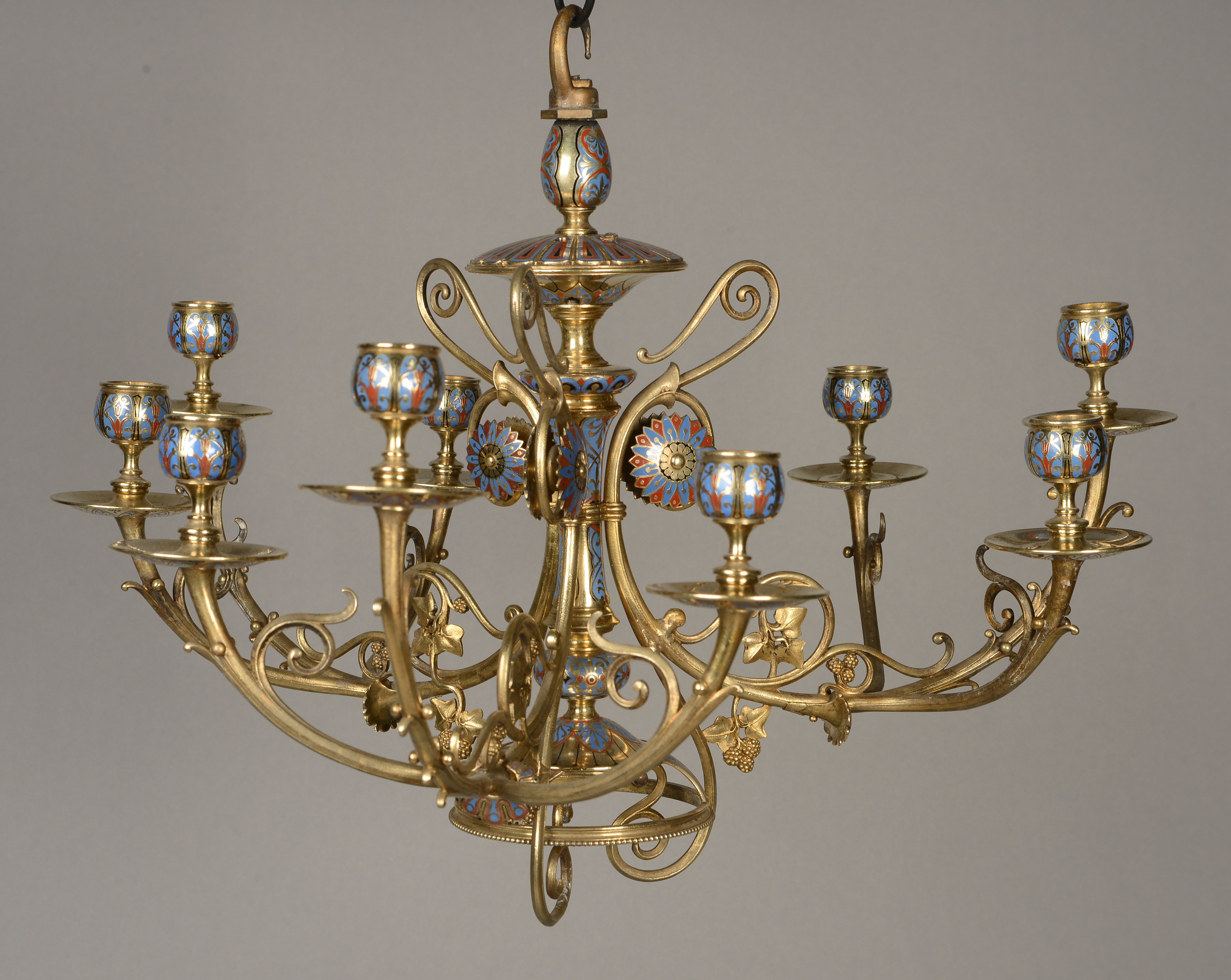 A CHAMPLÉVE ENAMEL AND BRASS CHANDELIER, probably by Elkington,