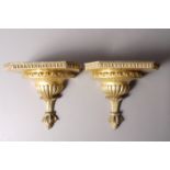A PAIR OF GILTWOOD WALL BRACKETS, 20th century, each of canted rectangular form,