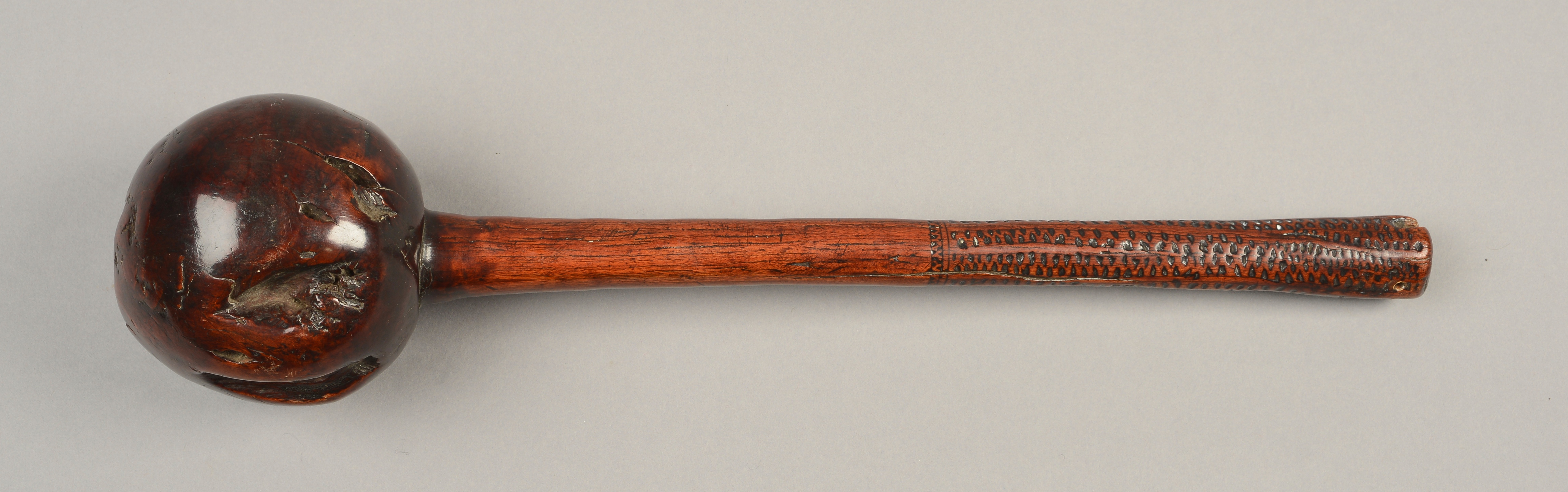 AN AFRICAN HARDWOOD KNOBKERRIE, probably Zulu, late 19th century, with textured hand grip.