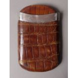 A SILVER MOUNTED EDWARD VII CROCODILE CIGAR CASE of rounded rectangular form with inner sleeve,