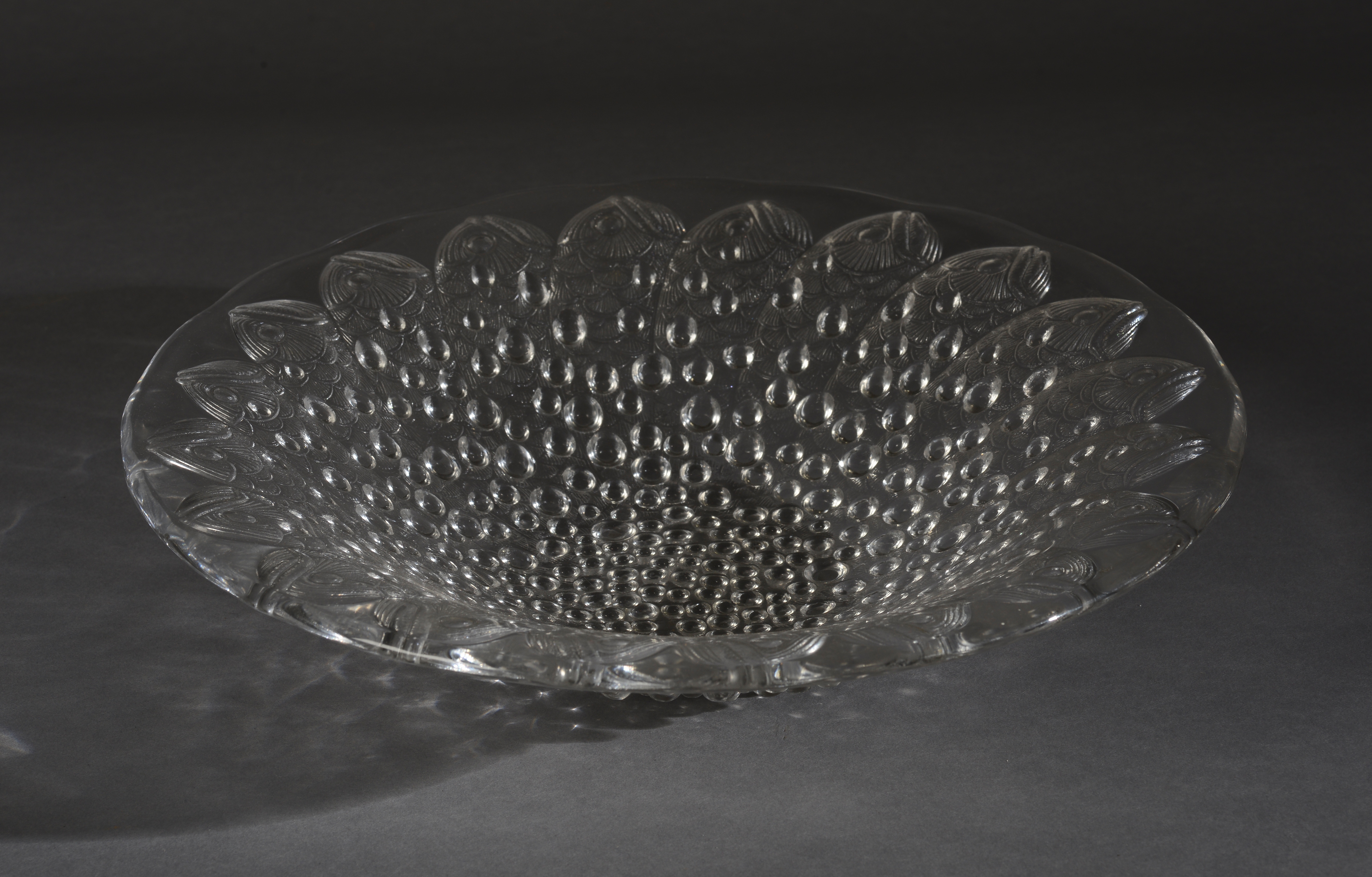 A LALIQUE 'ROSCOFF' BOWL, moulded with radiating fish and bubbles, in clear glass,