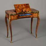 The Property of a Lady
A LOUIS XV ORMOLU MOUNTED TULIPWOOD AMARANTH AND MARQUETRY 'TABLE À ÉCRIRE',