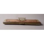 A VICTORIAN BRASS BOUND LEATHER EXPANDING GLOVE BOX of rectangular form,